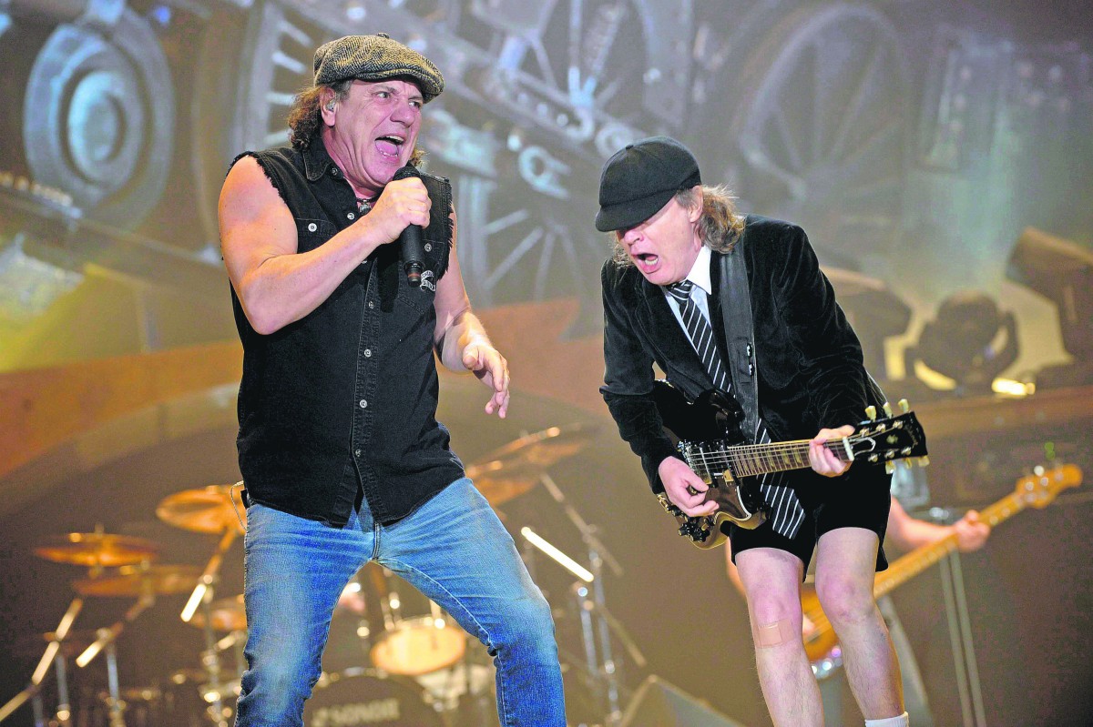 twee leden van de muziekgroep AC/DC